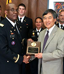 University President Wallace Loh accepts the MacArthur Award on behalf of UMD's Army ROTC program