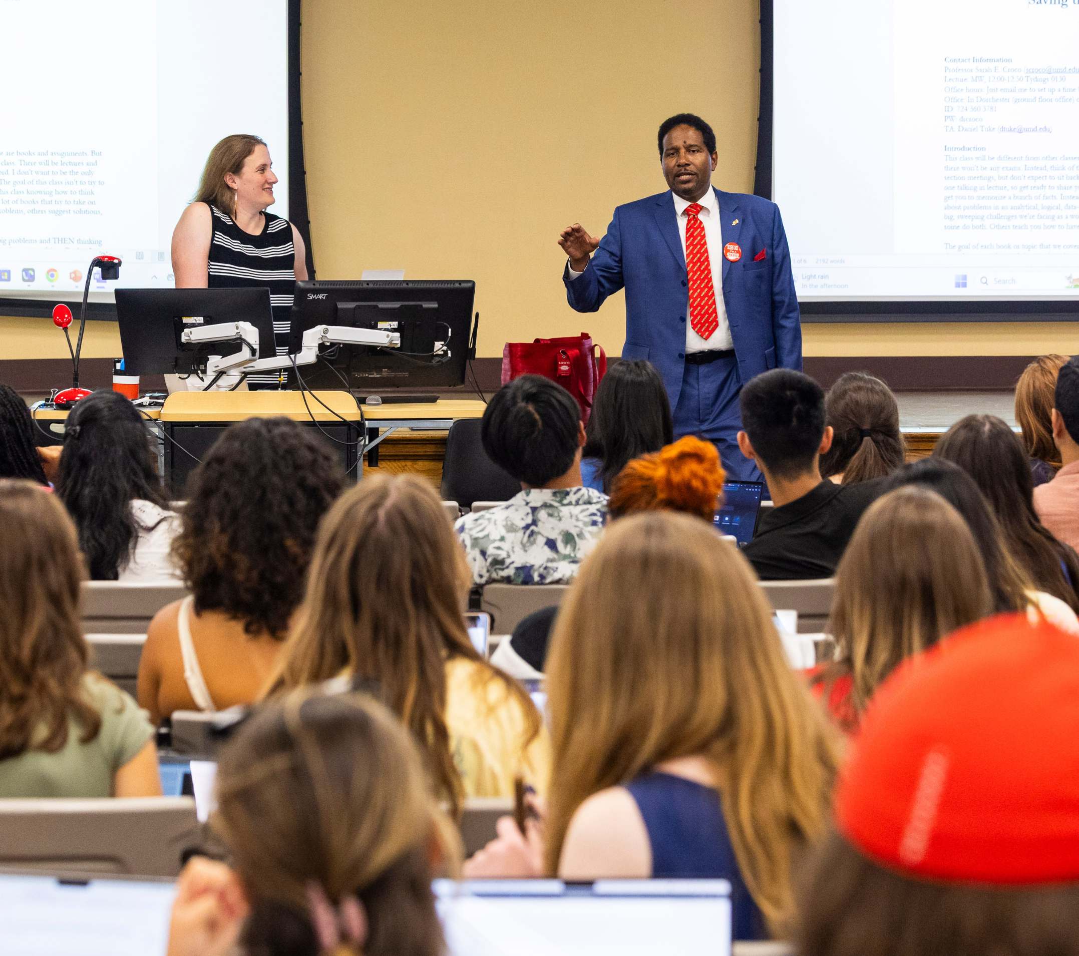 President Pines talking to students