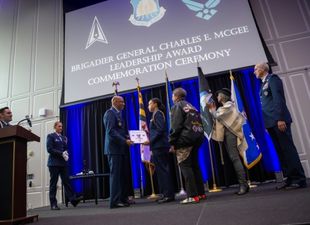 officers on stage at ceremony