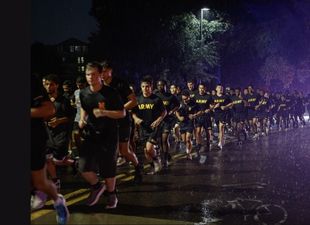 ROTC cadets running in rain