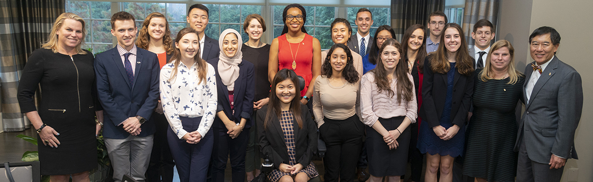 Scholars with Cathy Merrill and President Loh